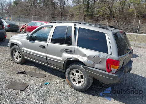 2001 Jeep Grand Cherokee Laredo из США, поврежденный, VIN 1J4GW48S01C657952